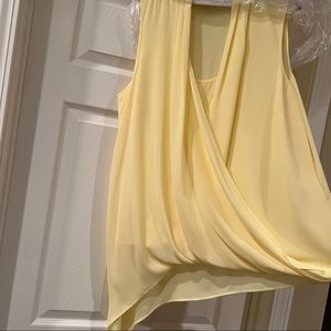 Like new! Worn 1X and dry cleaned. Yellow High/low Alfani blouse. 16W.